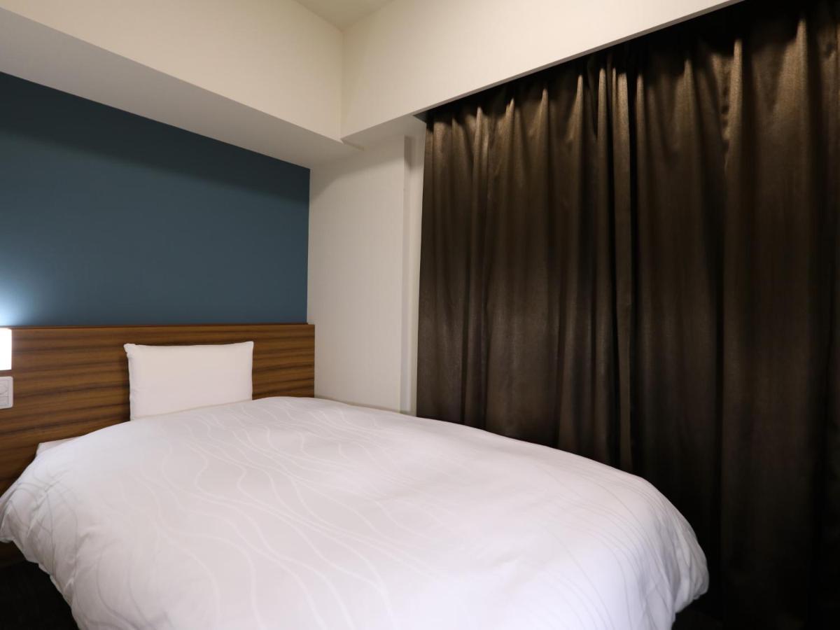 Dormy Inn Ikebukuro Tokyo Rom bilde